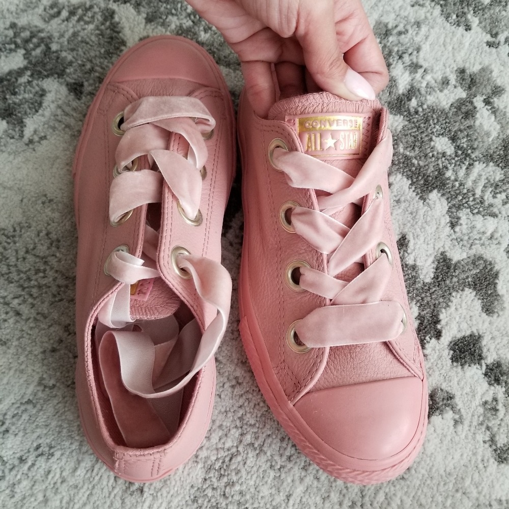All pink faux leather converses